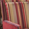 Close up of striped upholstery arm chair