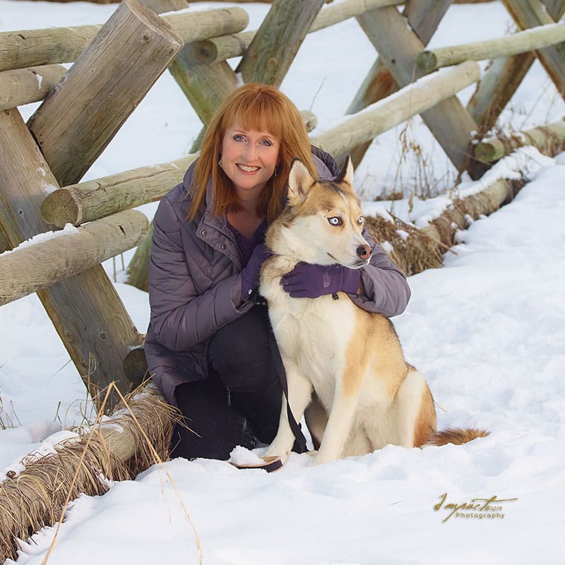 Jenn, Principal Designer / Owner of Spruce Personalized Decor with her dog, Joy